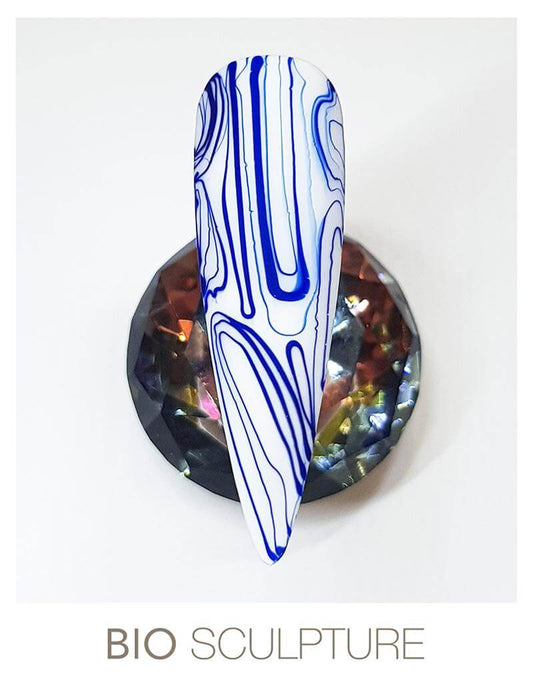 Blue Threading Gel - BIOGEL BIOGEL BIOGEL Threading Gel Blue Das zähflüssige Gel lässt sich in hauchdünnen Fäden auf dem Nagel verarbeiten. Verarbeitungs-Hinweis: - Tragen Sie das Gel auf das ausgehärtete und abgereinigte Farbgel auf. - Verwenden Sie zum