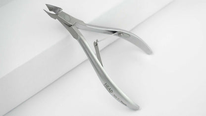 Professionelle Nagelhautzange X-line 7, L- 110mm, Klingen 7 mm Nagelscheren & Nagelknips Professionelle Nagelhautzange X-line 7, L- 110mm, Klingen 7 mm HEAD
